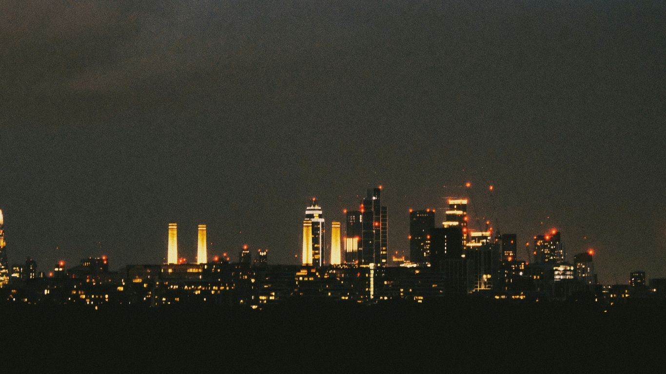 A view of a city at night from a distance