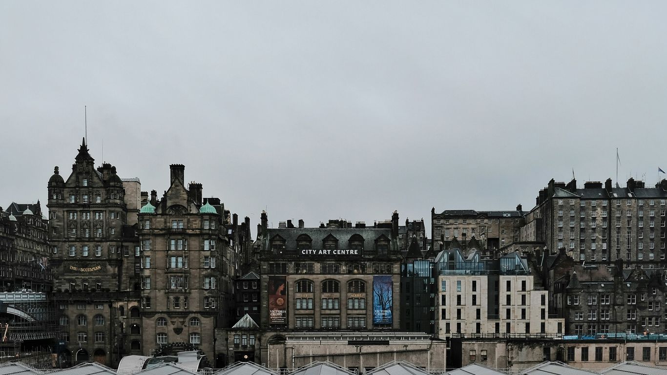 a large group of buildings with a sky background
